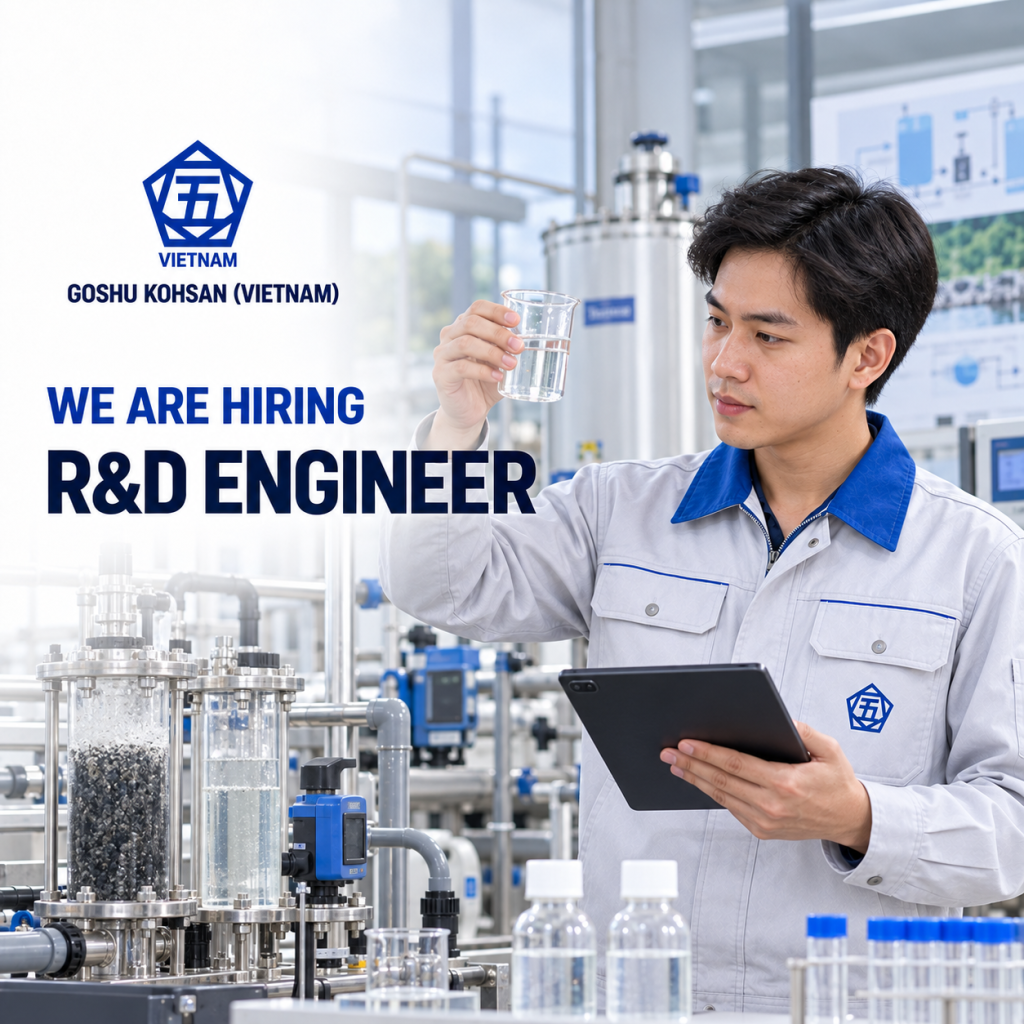 R&D engineer evaluating a water sample beside a pilot treatment system at Goshu Kohsan Vietnam
